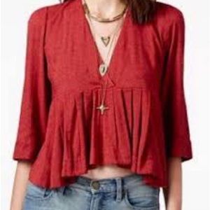 Free people red clay Pleats on me peplum cropped swing blouse